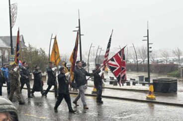 Cowal gathers in rain to honour the fallen
