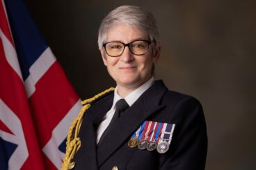 Naval base commander Clyde is honoured by the King