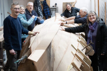 Holy Loch Sailing Club turns hull on community-built St. Ayles Skiff